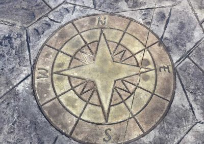 JP Custom Concrete can install imprinted artwork onto your custom stamped concrete patio