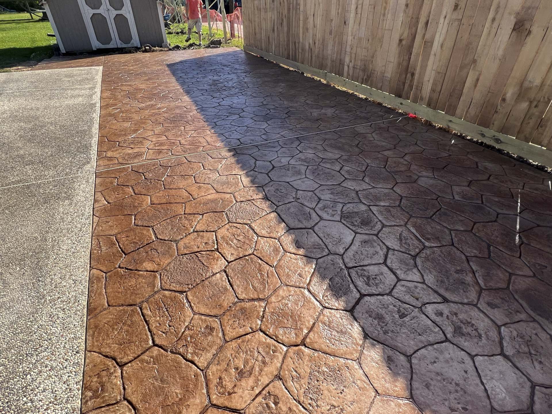 Backyard concrete patio and pool deck addition installed by experienced concrete company JP Custom Concrete in Houston.