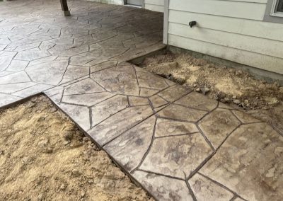 Stamped concrete sidewalk and patio installed by JP Custom Concrete in south Houston