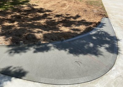 New driveway apron installed by expert concrete contractors at JP Custom Concrete