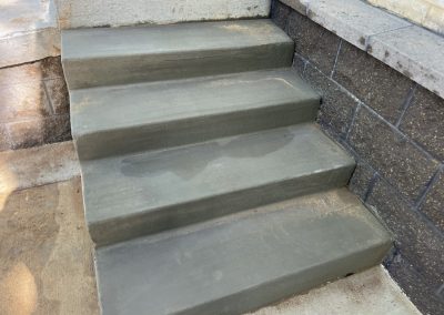 Concrete sidewalk steps installed by JP Custom Concrete in Friendswood, TX