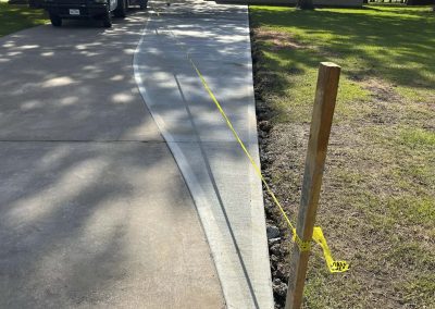 New driveway and driveway extension installed by JP Custom Concrete in Friendswood, TX