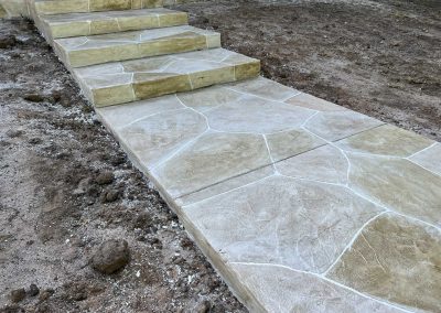 New concrete sidewalk installed by JP Custom Concrete in Friendswood, TX