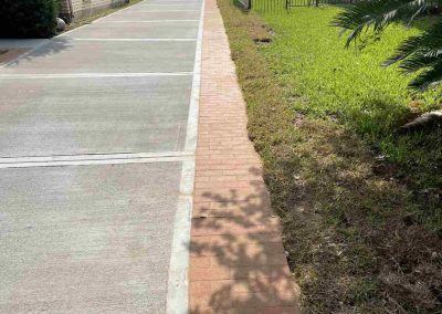 New Concrete Driveway With Paver Border in Friendswood, TX